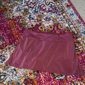 Lulu lemon dark pink tennis skirt, size 10